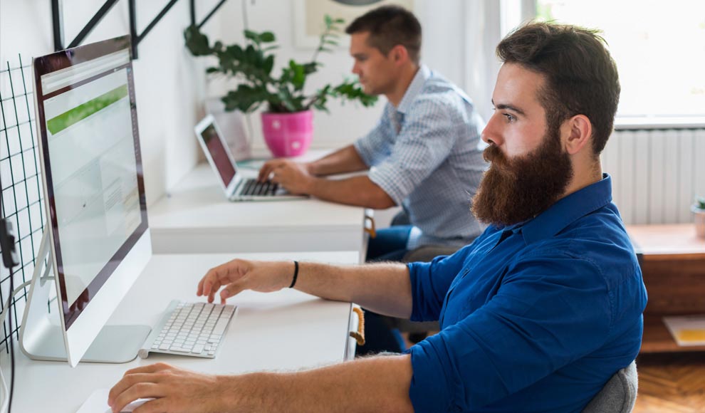 Man in front of computer