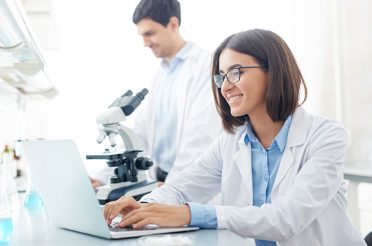 happy scientist working in lab