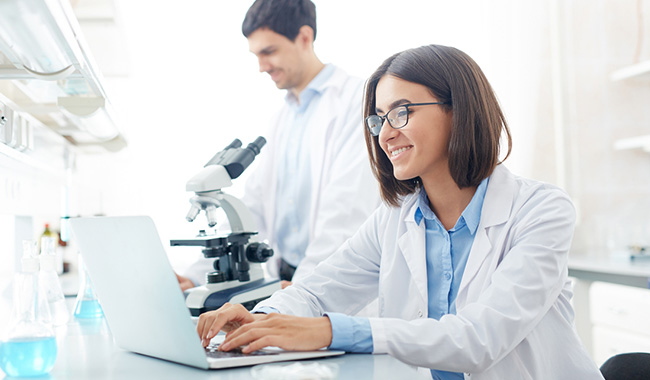 happy scientist working in lab