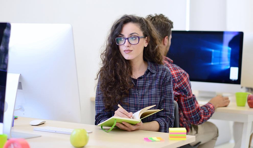 Busy Young Woman In Glasses