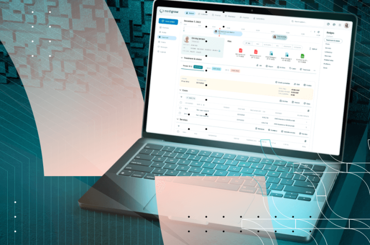 Laptop displaying medical data management software.