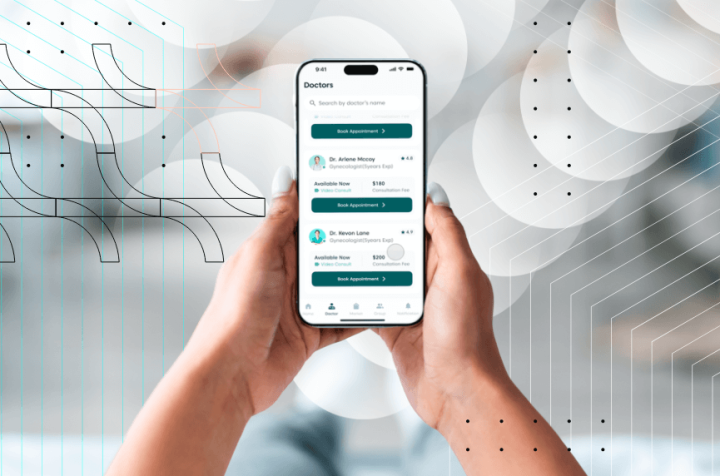 Hands holding a smartphone with a medical appointment scheduling app.
