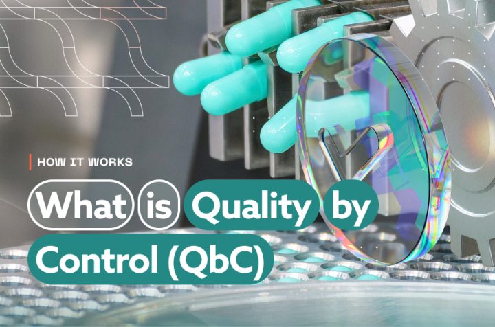 Close-up of teal medicine capsules in a production machine with text overlay: What is Quality by Control (QbC).